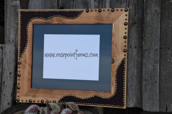"BEN" tooled leather with hand tacks. 16x20 opening with 11x14 matte opening. $150.00.
While any frames can be made as pairs,
BEN is a perfect partner for LILLY!