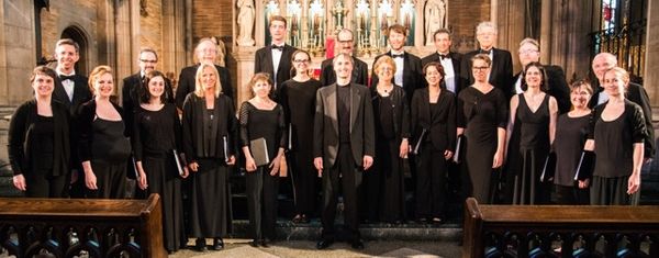 Cerddorion Vocal Ensemble under the direction of Dr. James John. The ensemble gave a landmark performance of Boukas Beatles Motet "Please Please Me" (see audio player above, tracks 1-3)