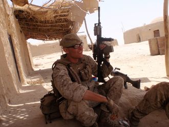 Taking a break from patrol, Musa Qala, Helmand Province, Afghanistan 2010