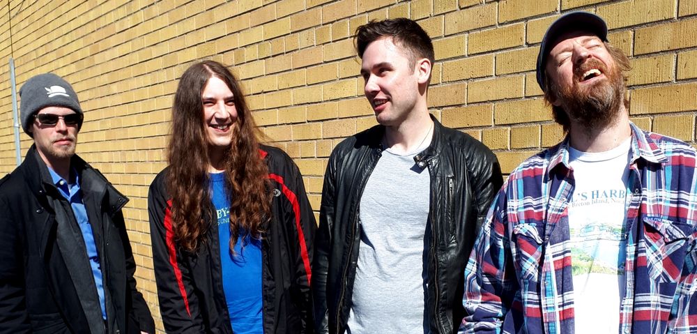 Meet The Neil MacNaughton Band: Alex, Zach, Brian and Neil.