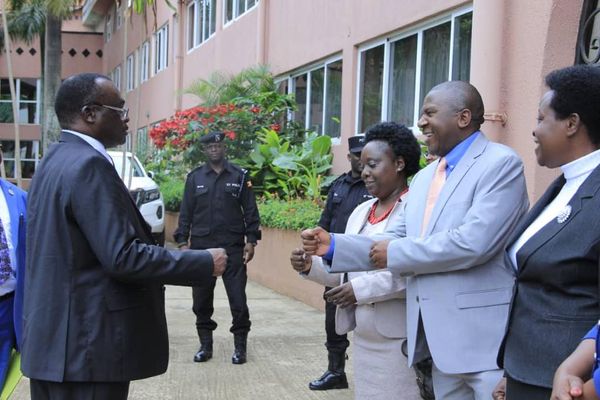 Justice Musa Ssekaana welcomes Chief Justice at the induction of appointed judges at Golf Course hotel, Entebbe