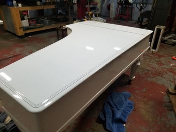 claws TV show piano with the lid on prior to crating . the timeline was so tight we had to crate this while the epoxy paint was still curing and ship it set up like this.
