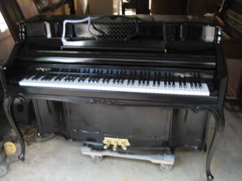 1964 Kimball Artist console after getting a new semi gloss ebony finish. Bench was recovered in black leather as well.