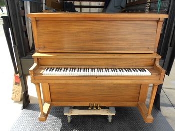 1922 Schaff that came in with a fractured case, weak floor. We rebuilt all that stuff, piano sounded great but we did replace bass strings and refinish in ebony.