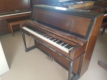 1952 Wurlitzer Studio 45 inches tall, 24 inches deep, 58 inches wide with bench, currently being refinished and having some other work done. 2400.00 delivered, tuned, warranty.