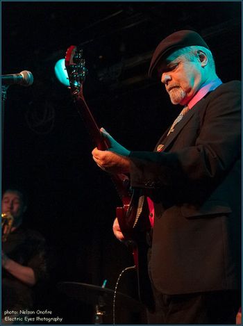 Brad Vickers on guitar at the NYC Great Day In The Morning CD release concert. Photo by Nelson Onofre.