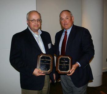Darrell and pitching legend Nolan Ryan, receiving meritorious service awards from the National Pedigreed Livestock Council