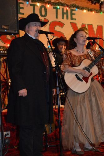 Singin' at the the Texas Cowboy Christmas Ball, backed up by Michael Martin Murphey's 'Rio Grande Band' in Anson, Texas, 2012. (see steel guitar great, Herb Steiner, behind Miss Devon)