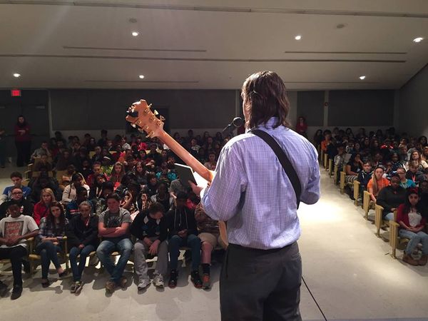 GJC Director Matt Dingledine talks to the 8th grade IB students at Woodmont Middle School about being a professional musician.