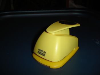 This is the hole punch to punch the hole in the top of the door hanger. It is a Marvy Uchida hole punch. You can buy this at Michael's craft store or other craft stores. The hole punch cost around $6.