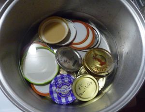 reusing canning lids and one piece lids by boiling in water