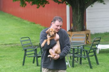 Steve & Elysia brought Kamali home for a visit today. Her first week in her new home has been great. We had lots of rain today so we took the puppies inside to play!