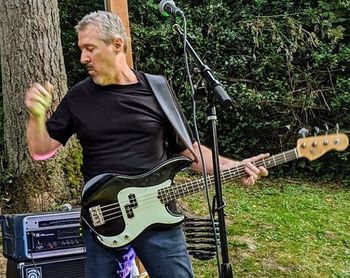 ~ Roy McDowell - Bass, Vocals - Roy's been playing for numerous bands around the South Sound for the last 20 or so years. Whether he's driving keys, or sporting a bass playing Country, Blues or Rock, he always strives to put on a good show for everyone and has a blast performing on stage. He is excited to be joining forces with Knee Deep to do what he loves...rockin the bass and having a good time. Be sure to say hello to him at our next show. We'll make sure he doesn't bite...
