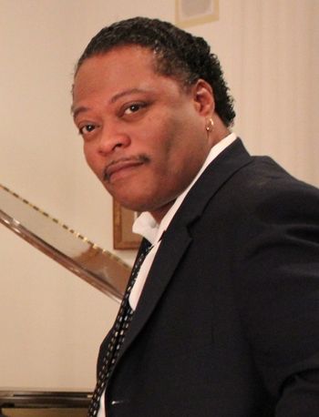 Tracey Whitney's co-producer, Herman "Hollywood" Dawkins on the photo shoot for the "I Am Singing... Songs I Love" CD