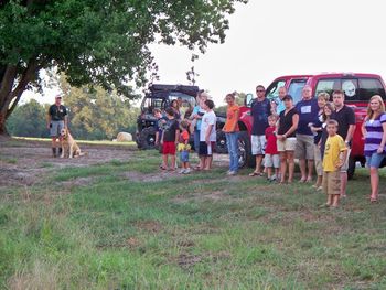 Angie prepares Thorne for his part in the "Roxy Ministry Retriever Demo". This is near the swim-by pond at our south pasture.