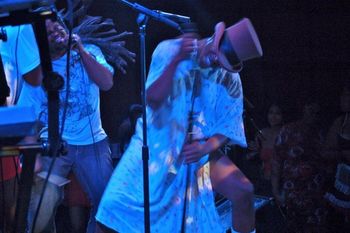 Creative Alliance Mad as a Hatter album release 2012. If you shake a microphone hard enough money falls out.