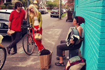 Ricky Berger and I being serenaded by the extremely talented Karla Lugo in Portland, OR. Photo by Caitlin Bellah