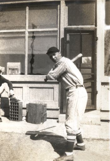 Stanley Tutaj played in the minors for the Cleveland Indians. Here he is in front of the store. The whole family were huge baseball fans at the time. Stanley was born in 1906 and died in 1986. He was a corporal in the US Army during WWII