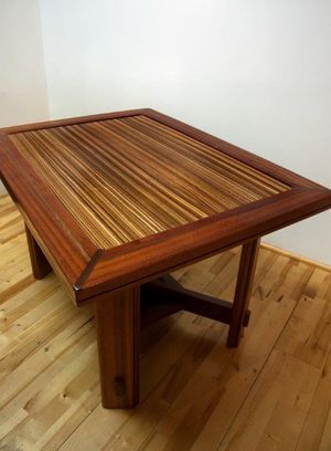 Zebra wood, Babinga, and Mahogany coffee table. 44" X 22" X18"