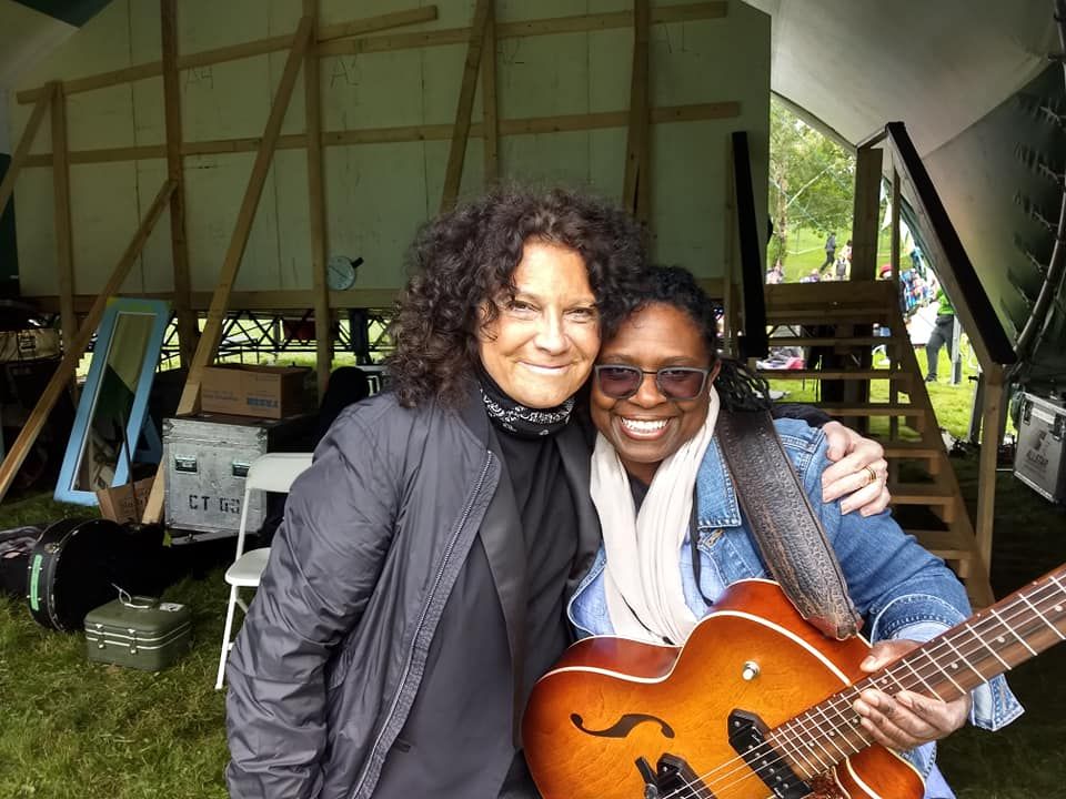 Rita with fellow blues gal Ruthie Foster at Bear Creek Folk Festival