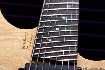 (02/24/15) This is a Strandberg Boden 8. This is one of the first production models that was made by Strictly 7. All my other Strandbergs are of the Washburn custom shop verity. I can definitely see why the switch was made. But with that this is still an amazing guitar. The body is a Flame Maple top over a Swamp Ash back. The neck and fretboard are Rosewood. The guitar was originally owned by the guitar player in Modern Day Babylon. He switched the pickups to Bare Knuckle Juggernauts. I added a set of Rosewood knobs. I wanted a higher end 8 string and this definitely fit the bill.