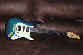 (09/17/2013) I made this guitar when I was about 13, It was a Carvin alder body and maple neck with ebony board. My friend did the finsh. It has a DiMarzio Evo in the neck and a Duncan distortion in the bridge and a Carvin AP11 in the middle. With a Wilkinson bridge and Sperzel locking tuners. It's such a versatile guitar and one of my all time favorites.