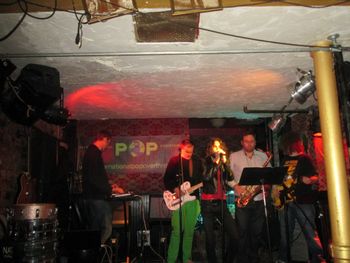 Performing at National Underground with Paul Bertolino, May 5, 2013, for the International Pop Overthrow Festival. Also included at cohorts Brad Whiteley (left) and Adam Minkoff (right).