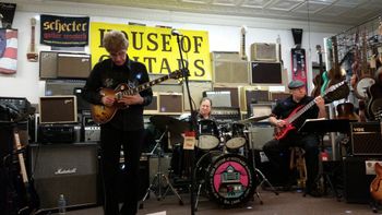 Craig Snyder, Mike PLouffe, Ron Broida at House of Guitars.
