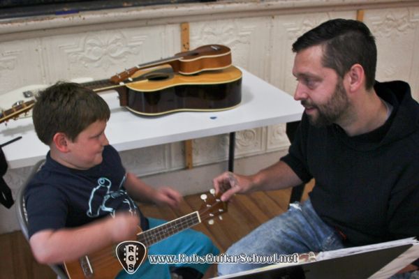 Kids learning ukulele in Newton, Groton, MA