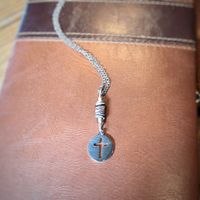 “At the Cross” (heishi beads)