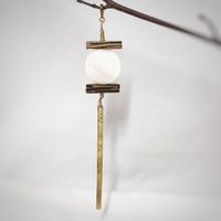 Mother of pearl and wood adornment