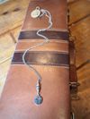 “At the Cross” (heishi beads)
