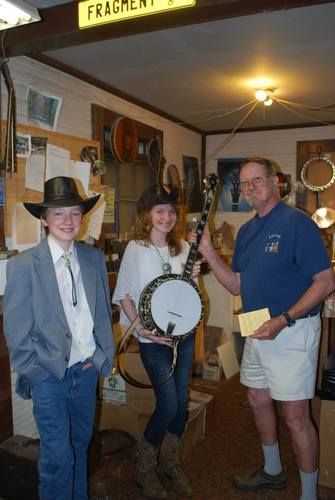 Geoff Stelling presenting custom made Stelling banjo to Marteka, named in her honor The "Marteka Challenge"
