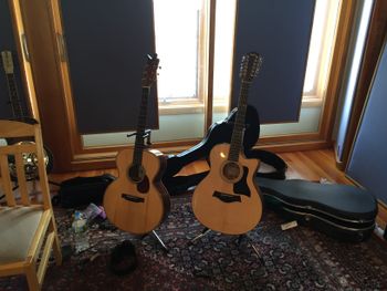 To the left of Jeffrey's Taylor 356ce (one of two Taylor 12's used on the record) - Will's Grammy-winning Froggy guitar (Jeffrey recorded the melody to Jackie's Grace on it).
