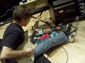Russ laying down lead tracks on his Fender Strat-- check out the two-tone Adidas sneakers :)
