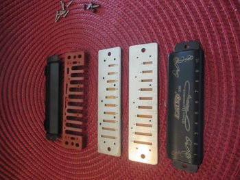 screws, covers, comb, reed plates taken apart
