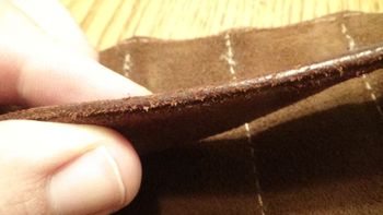 thick leather strap that is surprisingly soft and pliable...not stiff at all
