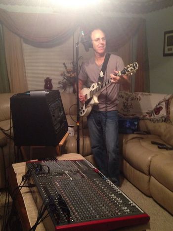 Mike Snow in the "Snow Studio", laying down guitar and vocal tracks for the FireLight Demo.
