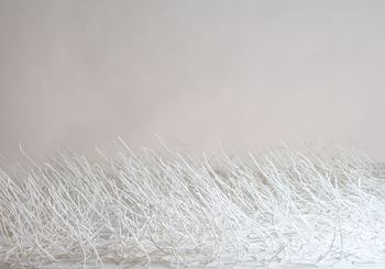 White acrylic strings out of canvas (2011)

