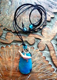 Whale necklace with blue stone
