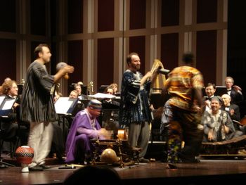 Imoro Sulley (right) gets audience dancing, with help from Derek Bermel, Bernard Woma, David Rogers.
