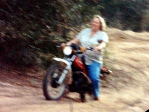 My mother, Carolyn Hacker, even got into the act, at 39 years old, buying her own 1980 Yamaha DT100G to ride with me. This photo was a rare appearance; her actually on a sandy motocross track. The intent was for her to ride with me just on street and dirt roads with me on my 50cc Puch moped that I got as my first "street bike" (you could ride them on the street at 15 years old back then with only a learner's permit and no full driver's license). So, since she was a novice rider, and I was already right on the edge of being a "pro" motocross racer by this point, we would occasionally ride together on weekends so she could, as she put it, "commune with nature", and since she would ride very slowly, my moped that could only top out at 30mph was the perfect fit for us riding together. How cool was that? How often do kids get to say they ride motorcycles WITH THEIR MOTHERS? Not very often, but we sure did. It wasn't terribly frequent, but it was an occasional weekend thing, but I actually got far more use out of her DT100G dual-sport than she did, truth be told. By 1981, it and my moped were my primary bikes, even more so than my YZs were. I wasn't technically legal on the DT, so I "snuck" it down the road and went for the nearest trails and dirt roads, but my 50cc Puch moped WAS legal when I turned 15, and so it became my "daily driver", for everything; school, social, etc., until we sold EVERYTHING (incredibly sadly) for me to get my first car, a 1976 Toyota Corolla, to drive to college starting in the Fall of 1983... It would be 5 years before I ever threw a leg over a motorcycle again, but this was indeed the END of my motorcycle CHILDHOOD...