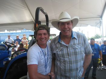 Greg and Michael Peterson at the Michael Peterson New Holland Tractor race CMA MUSIC FEST
