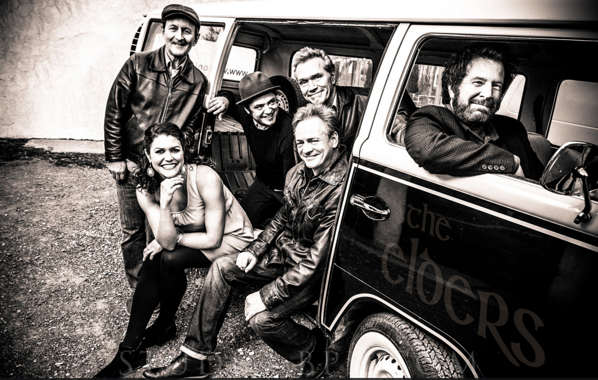 photo of the Elders band in a van. The photo is in artsy black and white