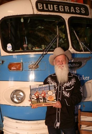 Don Clark holding the very first Flatt & Scruggs Album he purchased. This same album inspired him to create The Bluegrass Bus Museum.
