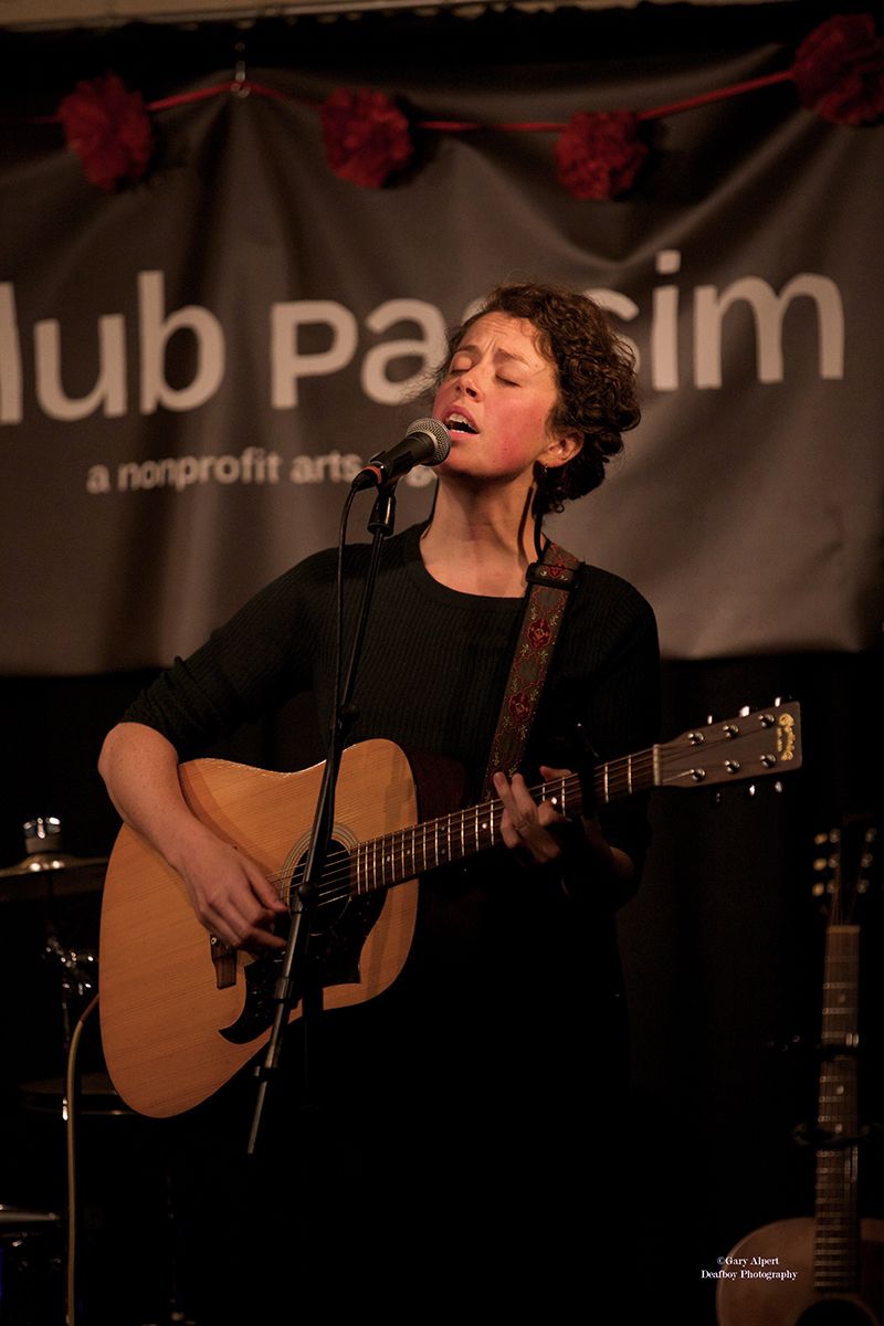 Indie-folk songwriter singing at Club Passim in 2016, by Gary Alpert.