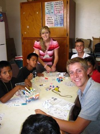 Suzanne, Christopher, and Jonathan leading crafts.
