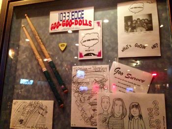 Here's the Goo Goo Dolls fan club promo stuff, drum stix, & guitar we donated to the Hard Rock Cafe Niagara Falls back in 1996. I created and drew those newsletters & one of the close ups of the newsletter is a black & white copy of a photo of Robby, me, Johnny, Sarah & Mike Goo. Also included is the hair of Mr. G Clinton in which I've performed with, too- so yes I've been in the music scene since a wee one   & I'm still here bringin' tha action
