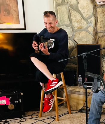 Howie pickin' at the house concert in White Bluff, TN June 30, 2024
