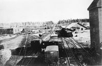 Looking south at Collingwood on the Provincial Gauge Northern Railway of Canada. 1860s. Engine house and freight shed. National Archives Canada PA 138976
